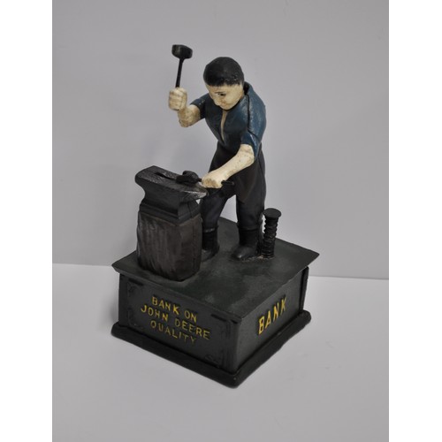 95 - John Deere cast iron money box