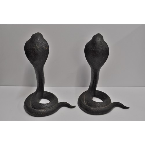 97 - A pair cast metal cobras,  approx. H 32cm