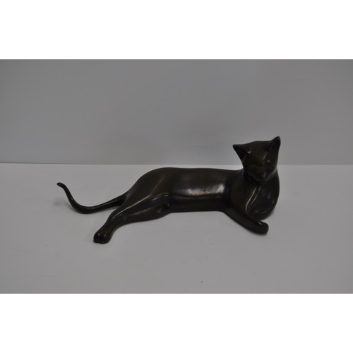 108 - Bronzed effect cat ornament in a resting position