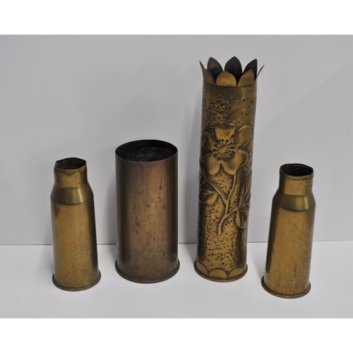 126 - Trench Art group consisting of brass shell casings, one with poppy design