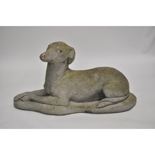 127 - A weathered garden ornament in the form of a Whippet/Dog, approx L 60cm X H 33cm AF