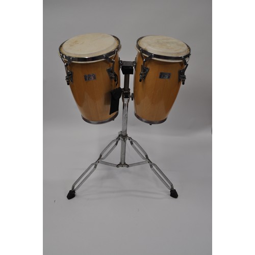 130 - Pair of Session Pro bongo drums, complete with stand and adjusting tools