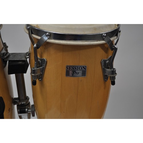 130 - Pair of Session Pro bongo drums, complete with stand and adjusting tools