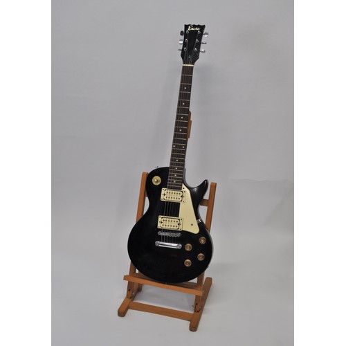 133 - Encore 6 string electric guitar in the Les Paul shape design (stand excluded)