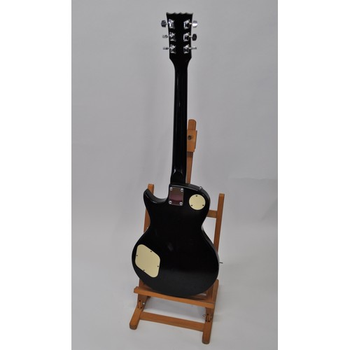 133 - Encore 6 string electric guitar in the Les Paul shape design (stand excluded)