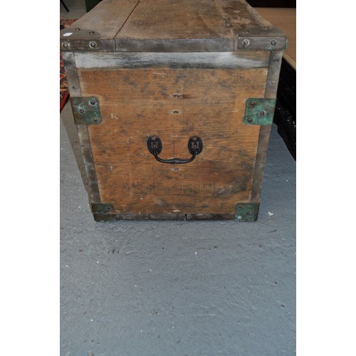 141 - Distressed wooden trunk with metal fixings, hinged lid to top. Approx size L 94 x H 47 D44cm