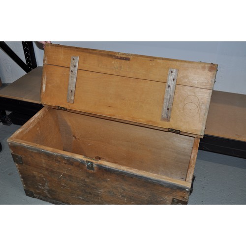 141 - Distressed wooden trunk with metal fixings, hinged lid to top. Approx size L 94 x H 47 D44cm