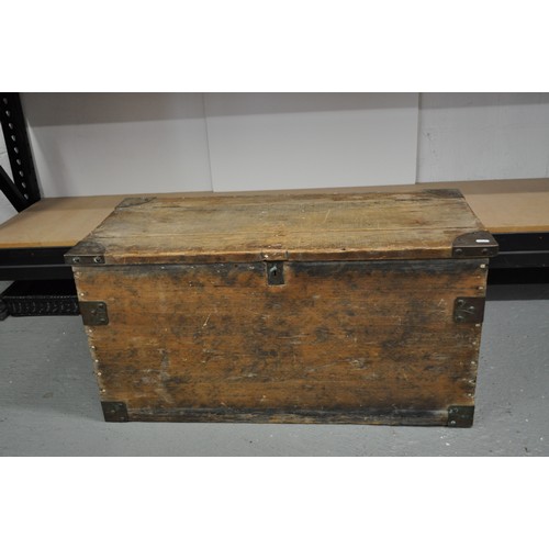 141 - Distressed wooden trunk with metal fixings, hinged lid to top. Approx size L 94 x H 47 D44cm