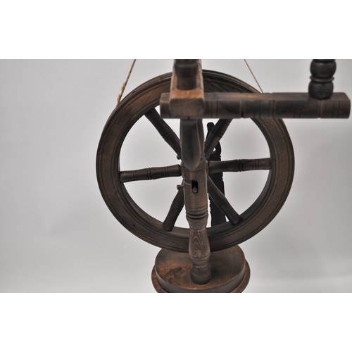 144 - Spinning wheel, approx overall height 4ft