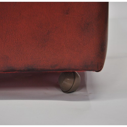 153 - Red leather pouffe stool with a storage facility