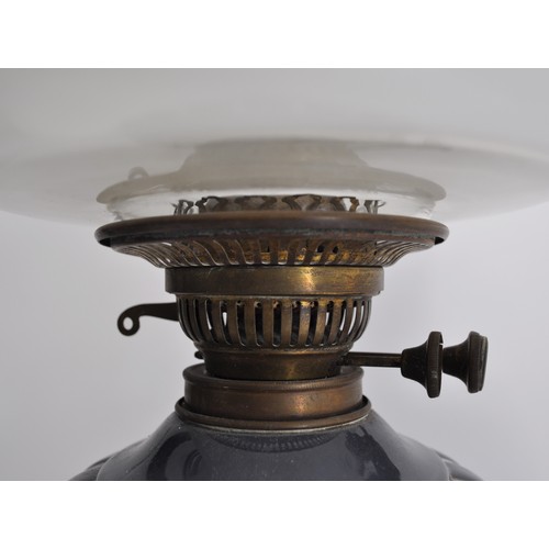 155 - Vintage ceramic oil lamp, decorated with floral pattern, complete with glass shade and funnel