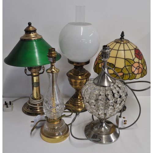 157 - x5 lamps - x4 electric in various colours and designs to include one tiffany style and x1 brass colo... 