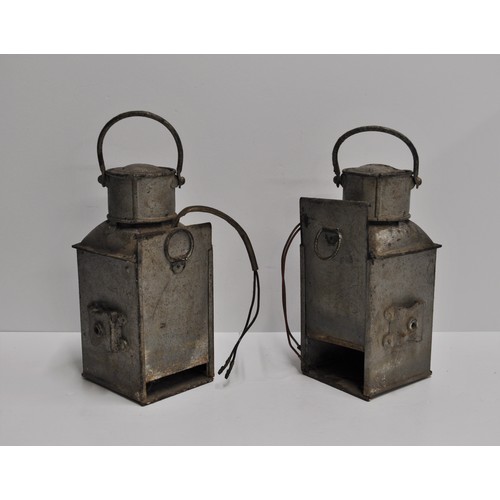 159 - A pair of galvanised ships mast head port and starboard lamps stamped and marked by O.M.Watts LTD