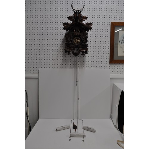 178 - Swiss Cuckoo Clock with stag head and black forest design, complete with weights, untested