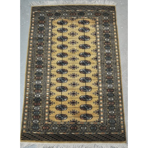 180 - Bokhara-style rug approx. H 66inch x W 39inch