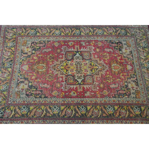 182 - Persian / Turkish Rug with geometric patterning to centre and flora design to borders with fringing,... 