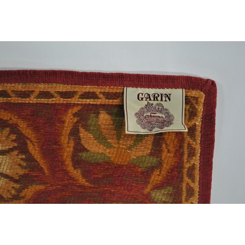 184 - Garin Rug in floral designs, red, green and beige. Approx size 122cm x 66cm