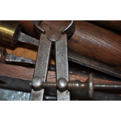 190 - Vintage carpenter's tools together with cabinet, items including wood-handled chisels, callipers and... 