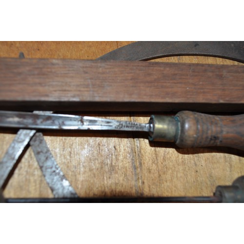 190 - Vintage carpenter's tools together with cabinet, items including wood-handled chisels, callipers and... 