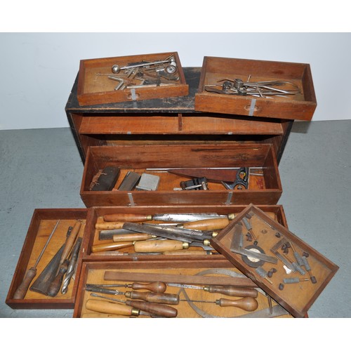 190 - Vintage carpenter's tools together with cabinet, items including wood-handled chisels, callipers and... 