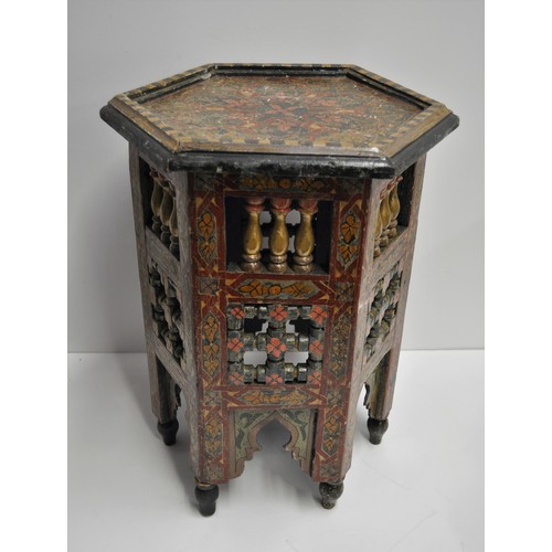 58A - Octagonal occasional / side table with geometric and floral patterns together with a ewer/teapot and... 