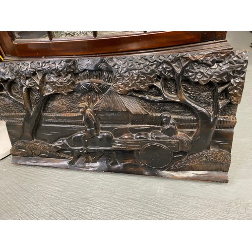 216 - Hardwood carved panel depicting a rural scene of a bullock cart