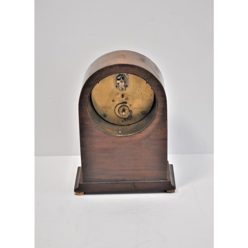 46 - Buren Mantle clock with marquetry/inlaid trim design, working at time of cataloguing, with key