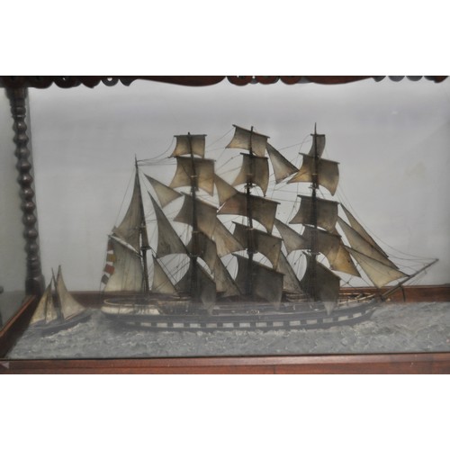 51 - A tall ship/tea clipper and boat at sea scene in antique glass and wood case approx. size of case W ... 