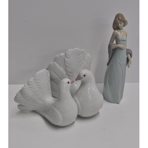 67 - x2 Lladro Items - Couple of Doves, model no. 01169   together with Vestido de Noche model 05487, bot... 