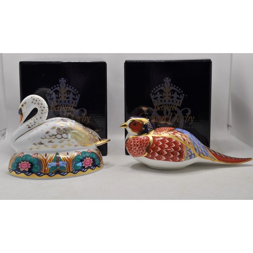 90 - Royal Crown Derby Swan paperweight gold stopper in original box, together with a pheasant paperweigh... 