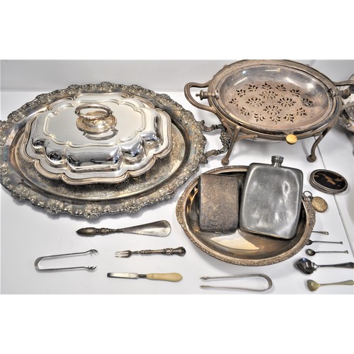 105 - A collection of silver and plateware items to include serving dishes and tray, spoons, sugar tongs, ... 