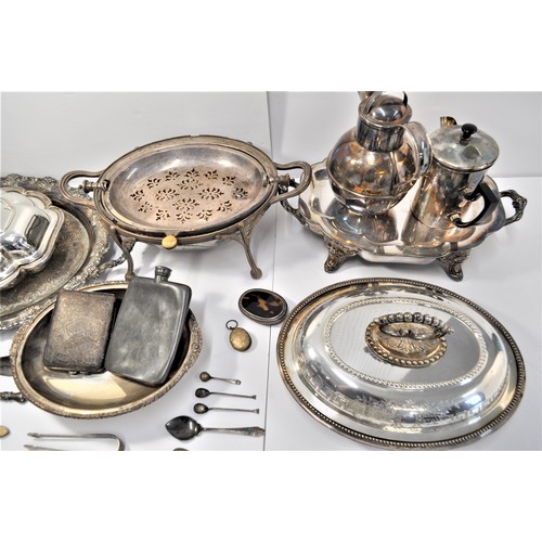 105 - A collection of silver and plateware items to include serving dishes and tray, spoons, sugar tongs, ... 