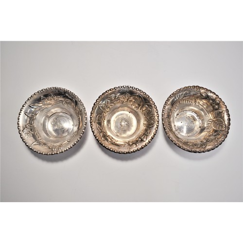 113 - A set of 3 antique silver bowls /dishes with floral embossing c. 1903, hallmarked London, DP (believ... 