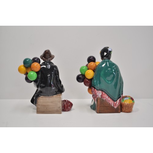 79 - Two Royal Doulton balloon seller figures to include 