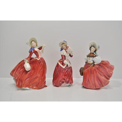 80 - ROYAL DOULTON: A selection of bone china figures entitled Christmas Morn, The Skater, Autumn Breeze ... 