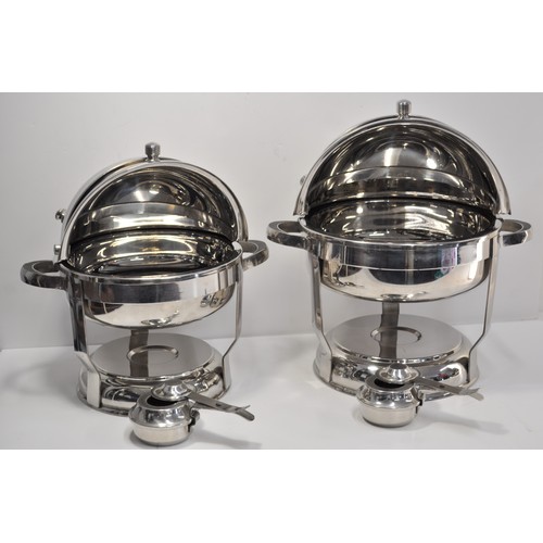 43 - Pair of large domed highly polished stainless steel food warmers with separate burners to base, and ... 