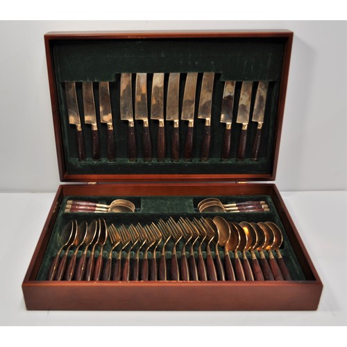 66 - 6 person cased canteen of cutlery finished in a gold tone with wooden handles