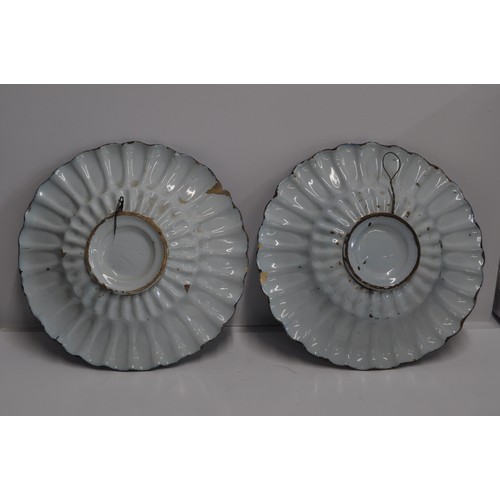 85 - A pair of antique faience blue and white Chinese style chargers, approx. diameter 35cm A/F