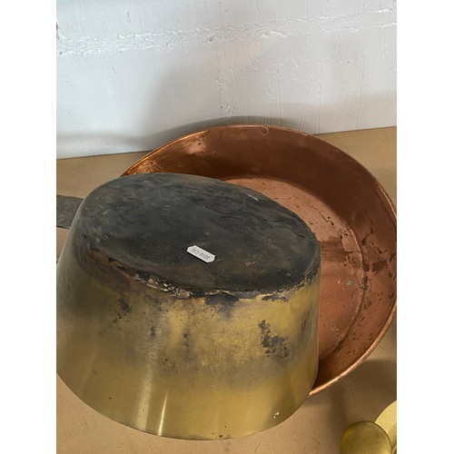 40 - Kitchenalia interest, a large copper frying pan together with one other metal pan