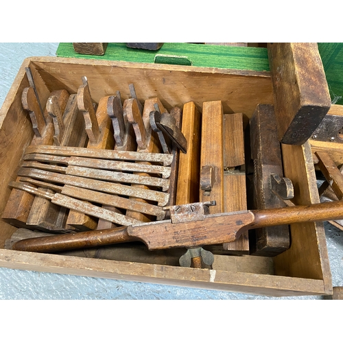 166 - A quantity of wood working tools to include saws, plough planes, rebate planes with blades, spirit l... 