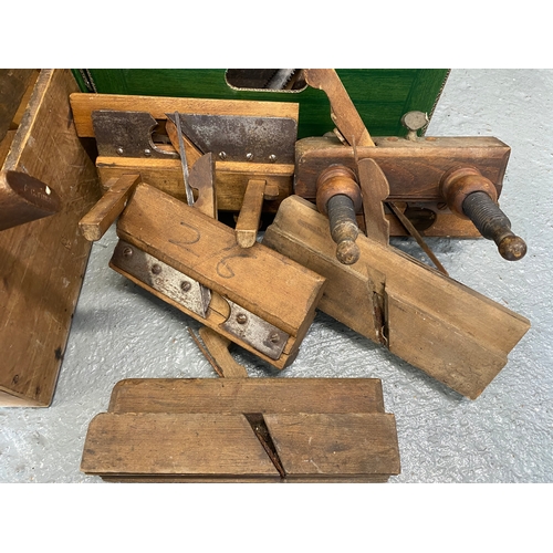 166 - A quantity of wood working tools to include saws, plough planes, rebate planes with blades, spirit l... 