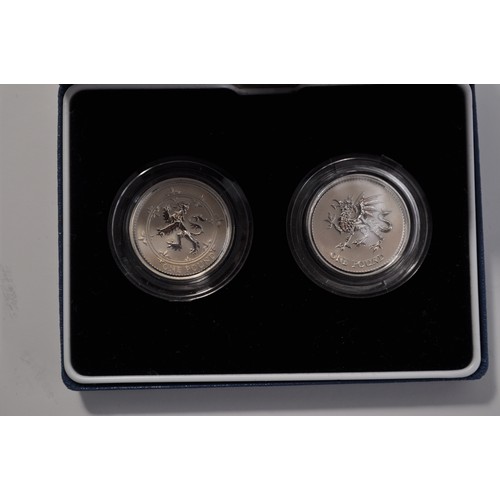 22 - 1999-2000 United Kingdom silver proof one pound coin millennium two coin set