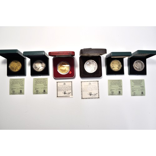 70 - Commemorative silver medallions- limited edition gold on sterling silver. Commemorating HM Queen Eli... 