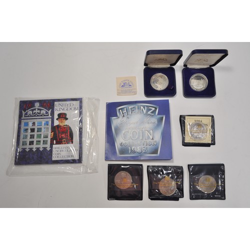 81 - Group of coins/medallions to include Royal Mint 1994 Barbados Silver proof $5, 2001 centenary £5 coi... 