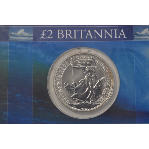 87 - X3 2002 silver bullion £2 Britannia coin together with X2 WI Cenetenary medals 1897-1997