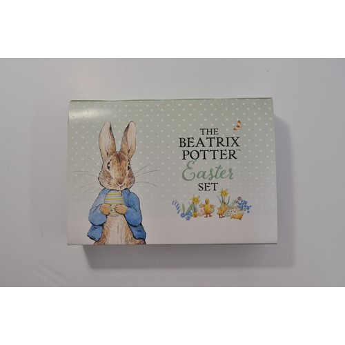 102 - Westminster The Beatrix Potter Easter Set, cased commemoratives feature Beatrix Potter characters at... 