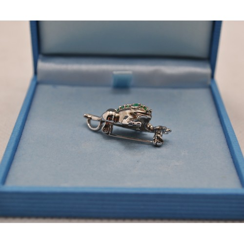 168 - A silver frog brooch together with a magnetic frog dish with diamontes and a frog pendant and chain