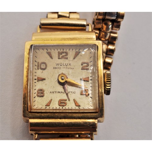 172 - Vintage Wolux wristwatch, case marked 18ct (strap rolled gold) together with 9ct gold bar brooch