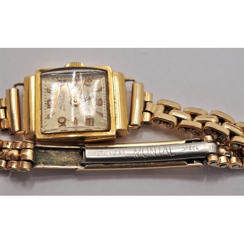 172 - Vintage Wolux wristwatch, case marked 18ct (strap rolled gold) together with 9ct gold bar brooch