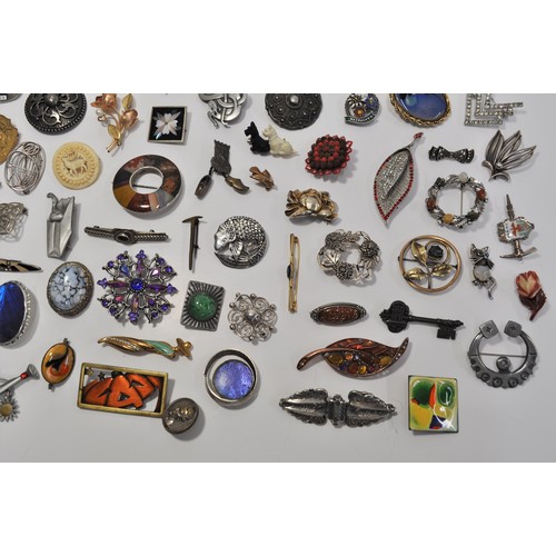 188 - A group of vintage and retro brooches of different shapes and designs to include, Herman Siershol br... 